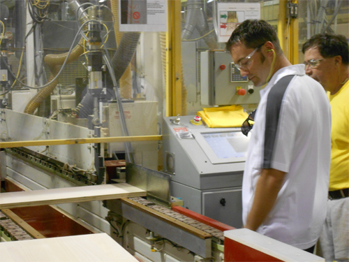 NASCAR driver Paul Menard visits Schrock Cabinetry NASCAR driver Paul Menard visits Schrock Cabinetry facility in Arthur, Ill. days before his win at the Brickyard 400. (Photo: MasterBrand Cabinets, Inc.)